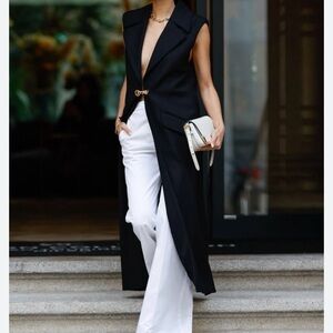 Stunning Black Sleeveless vest duster.    Size 8.